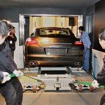 A Porsche Panamera on its way to the 94th floor of the World Financial Centre in Shanghai