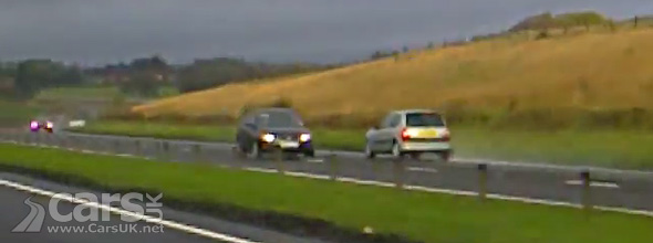 Moron drives wrong way up dual carriageway at speed