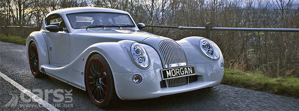 New Morgan Aero Coupe Grey New Morgan Aero Coupe by roadside