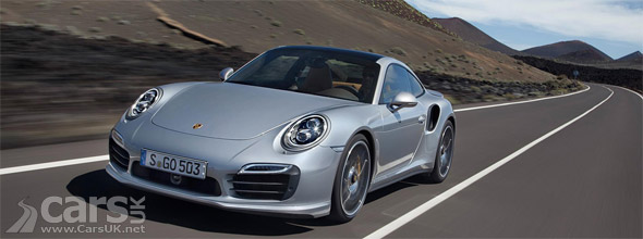 New 2013 Porsche 911 Turbo S driving on road