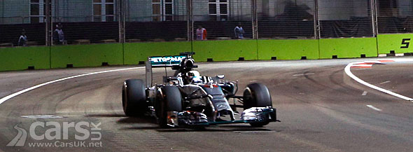 Photo Lewis Hamilton takes pole for Mercedes in the 2014 Singapore Grand Prix