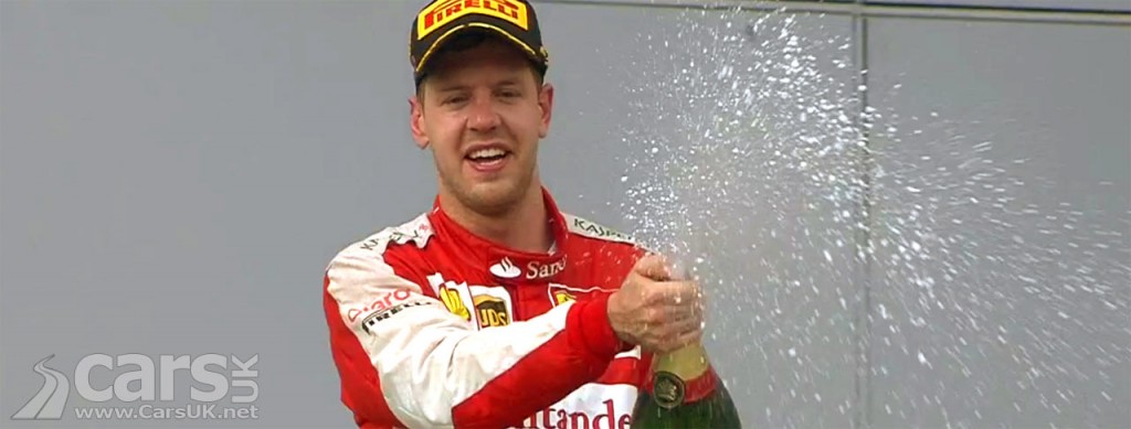 Photo Sebasiatian Vettel celebrating 2015 Malaysia Grand Prix win