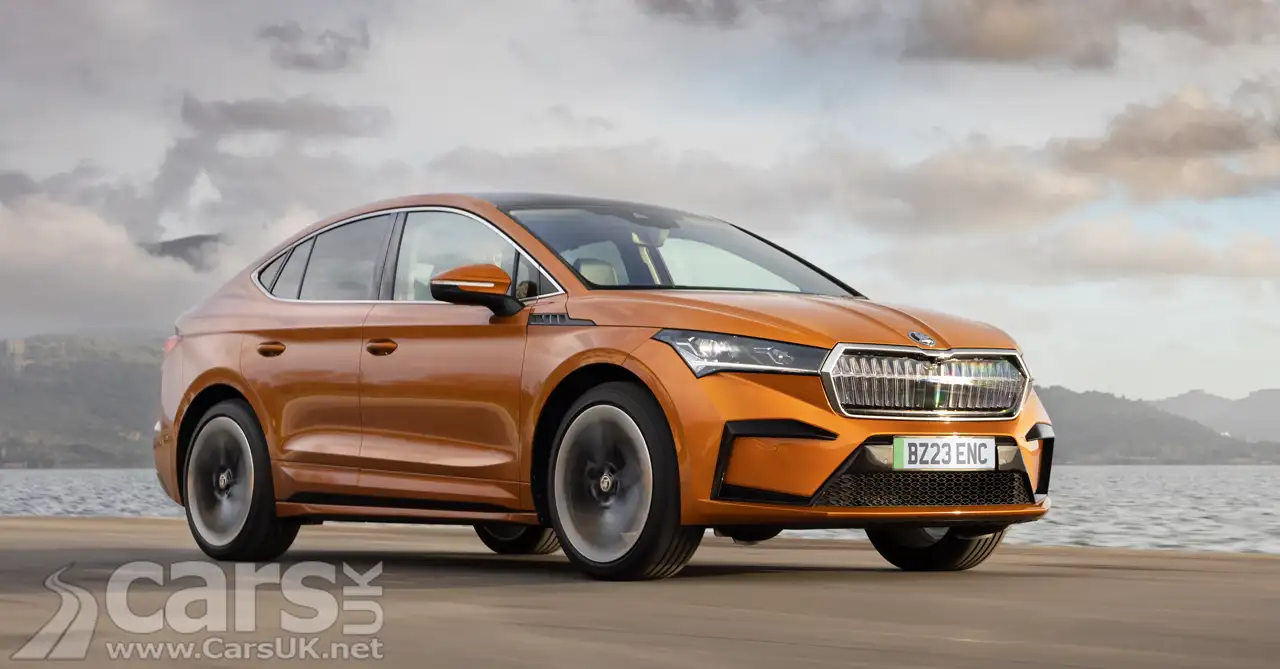 Skoda Enyaq Coupe iV pictured by water as the new Enyaq Coupe range arrives in the UK