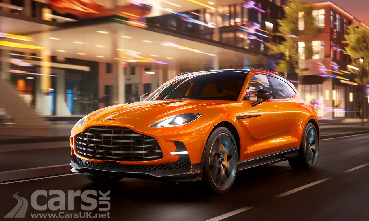 The updated Aston Martin DBX707 in orange on road at night