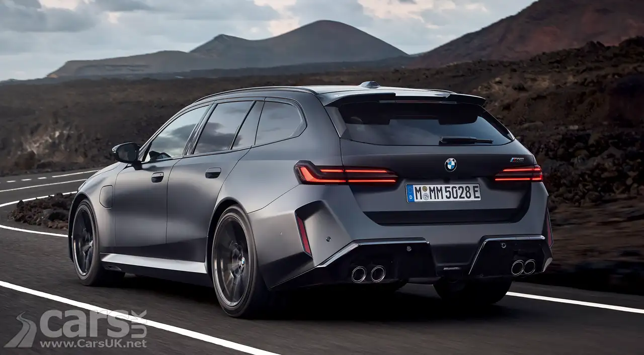 New BMW M5 Touring rear view on road