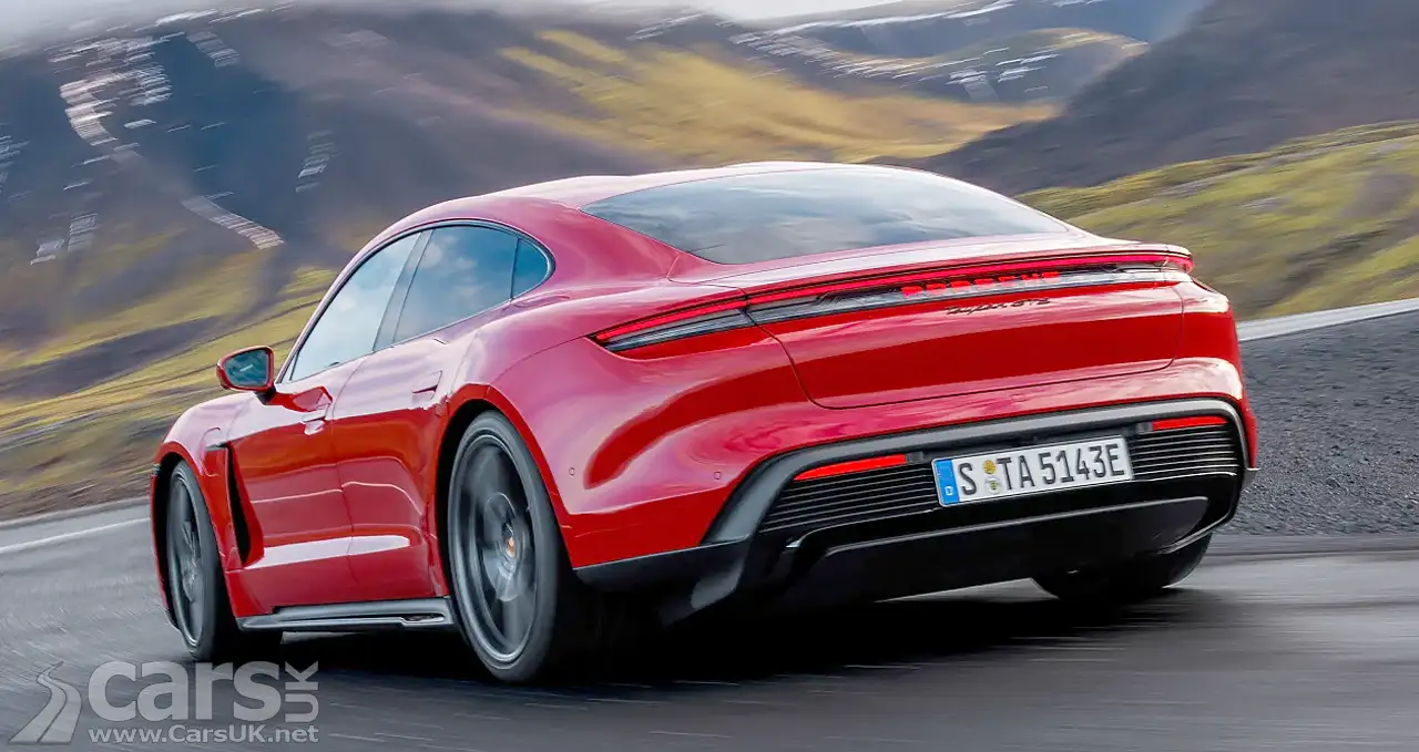 New Porsche Taycan GTS in red rear view on road